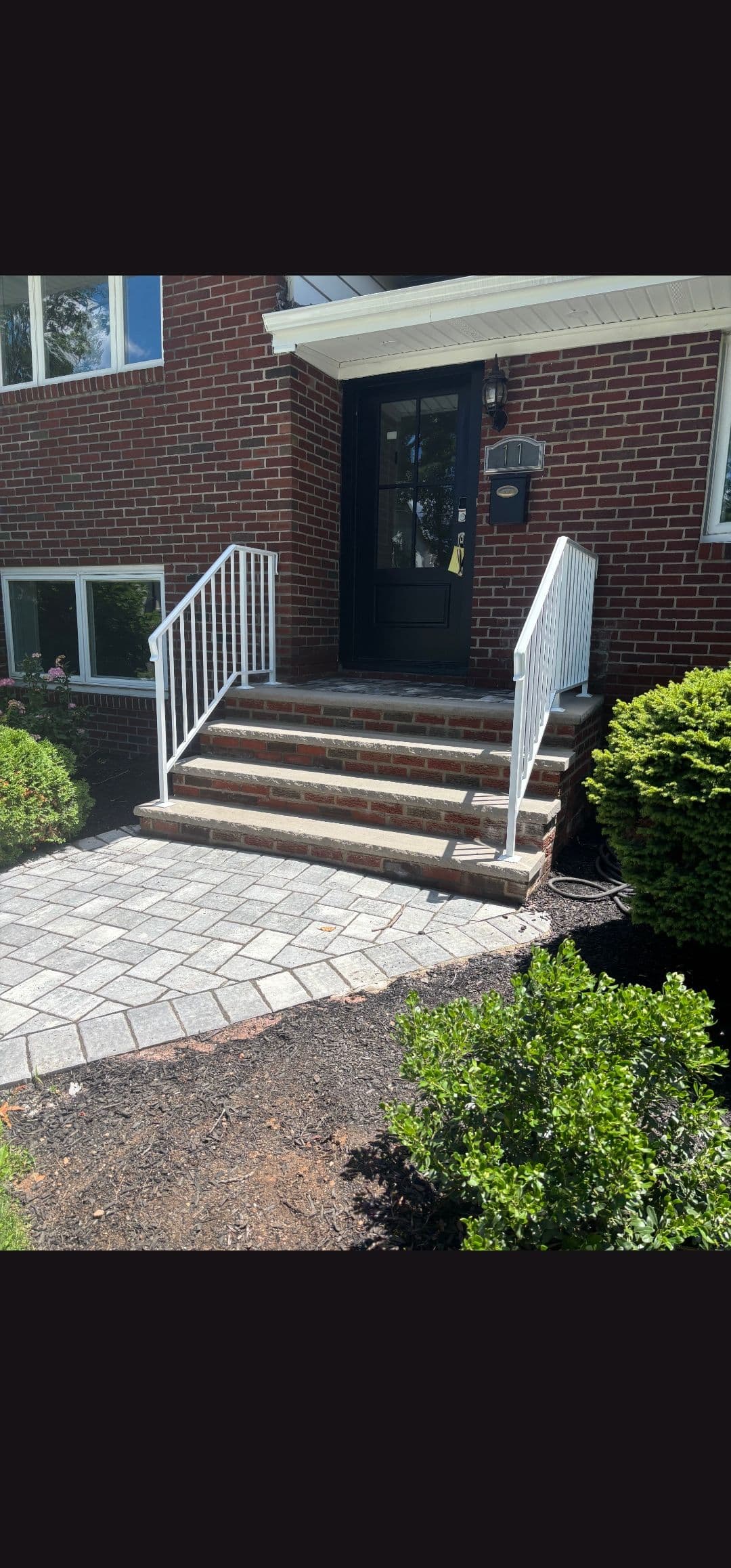 White Steel Railing Installation on Front Steps in Englewood Cliffs NJ image