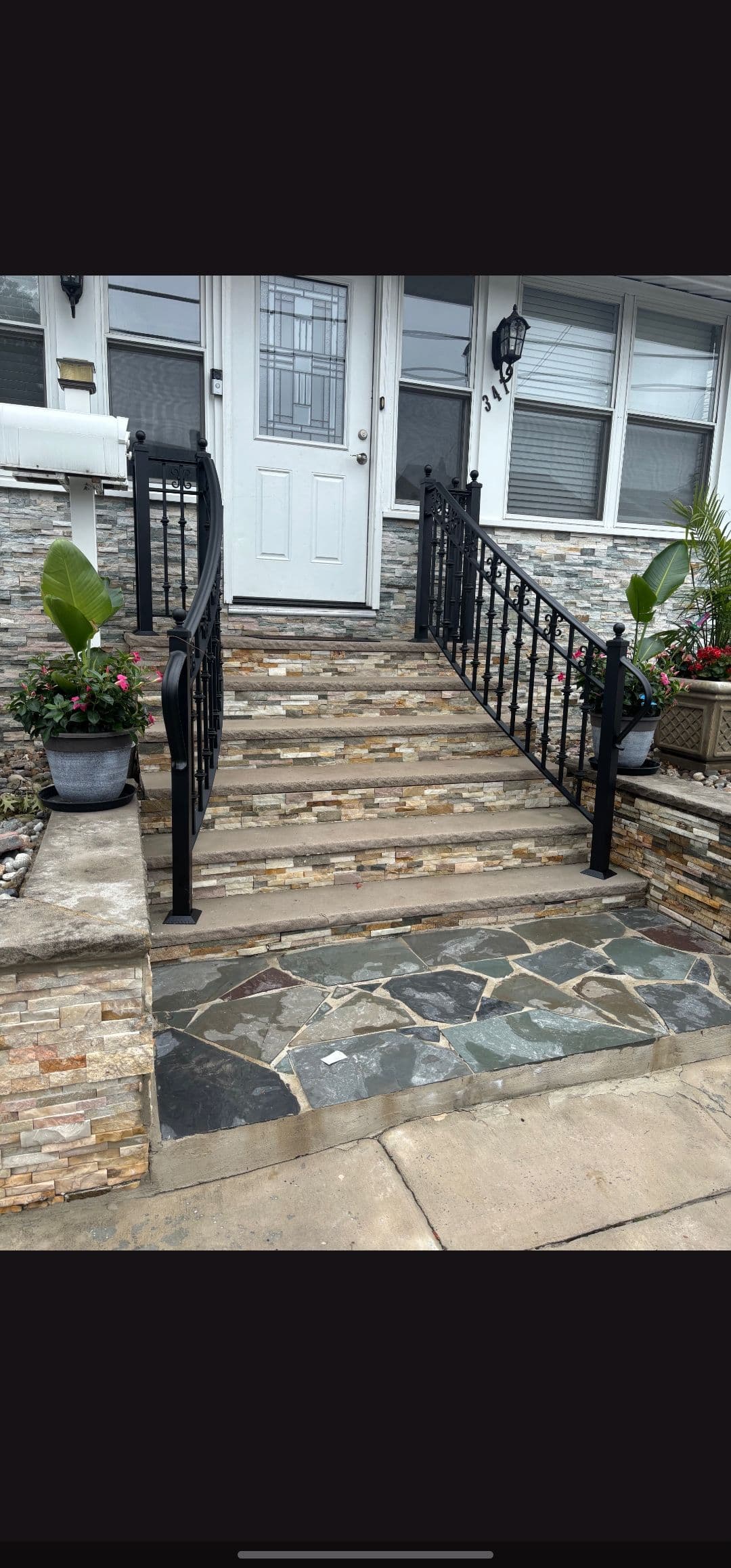 Project Custom Curved Aluminum Railings Built for a Stone Entry Staircase image