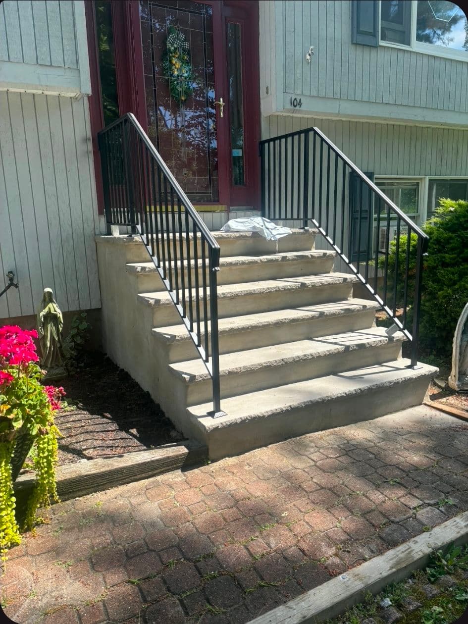 Steel Railings Installed on Masonry Front Steps image