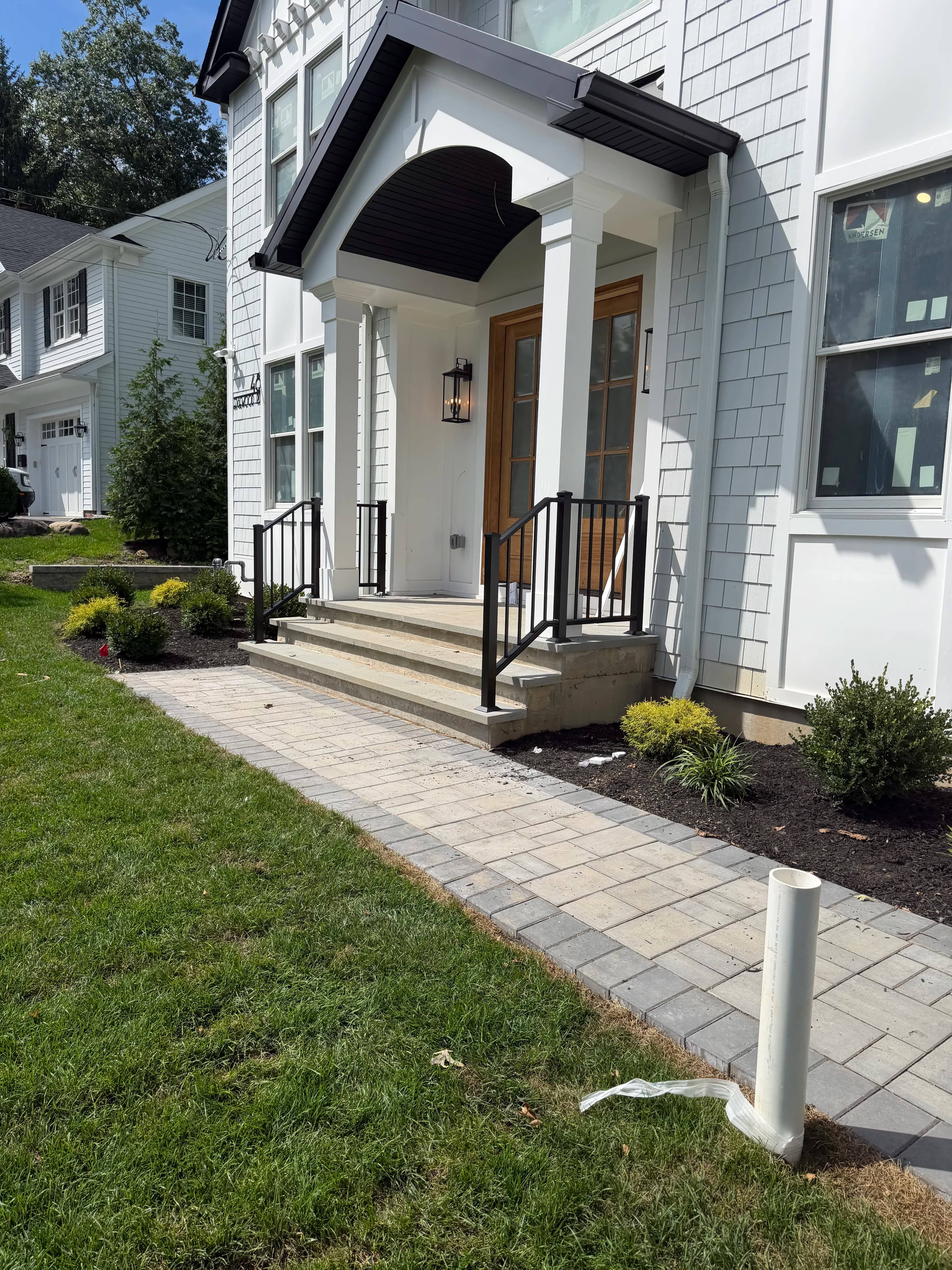 Project Black Aluminum Step Railings and Egress Window Guards Done Right image