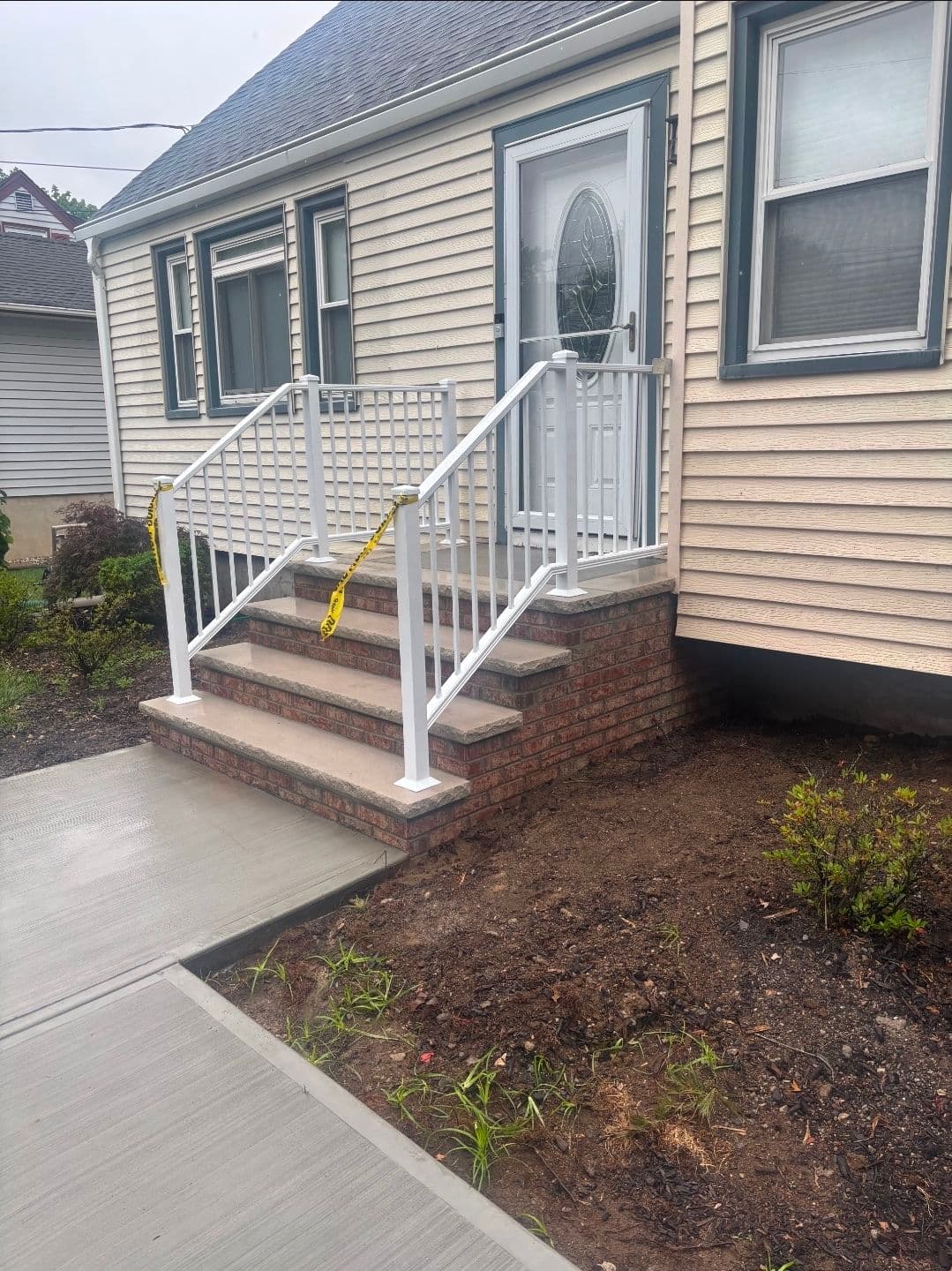 Fresh Aluminum Railing Install on a Residential Front Entry image