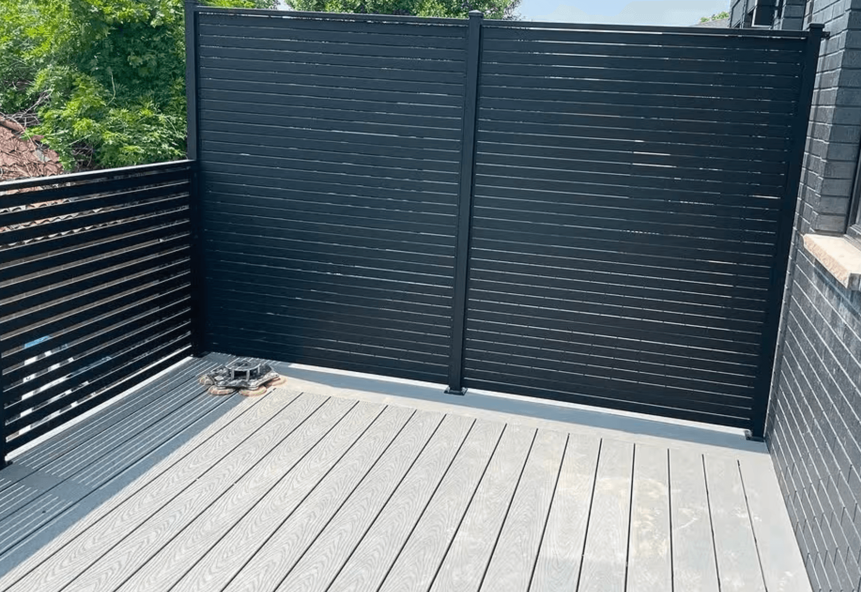 Custom Black Horizontal Slat Fence Installation in River Vale NJ image