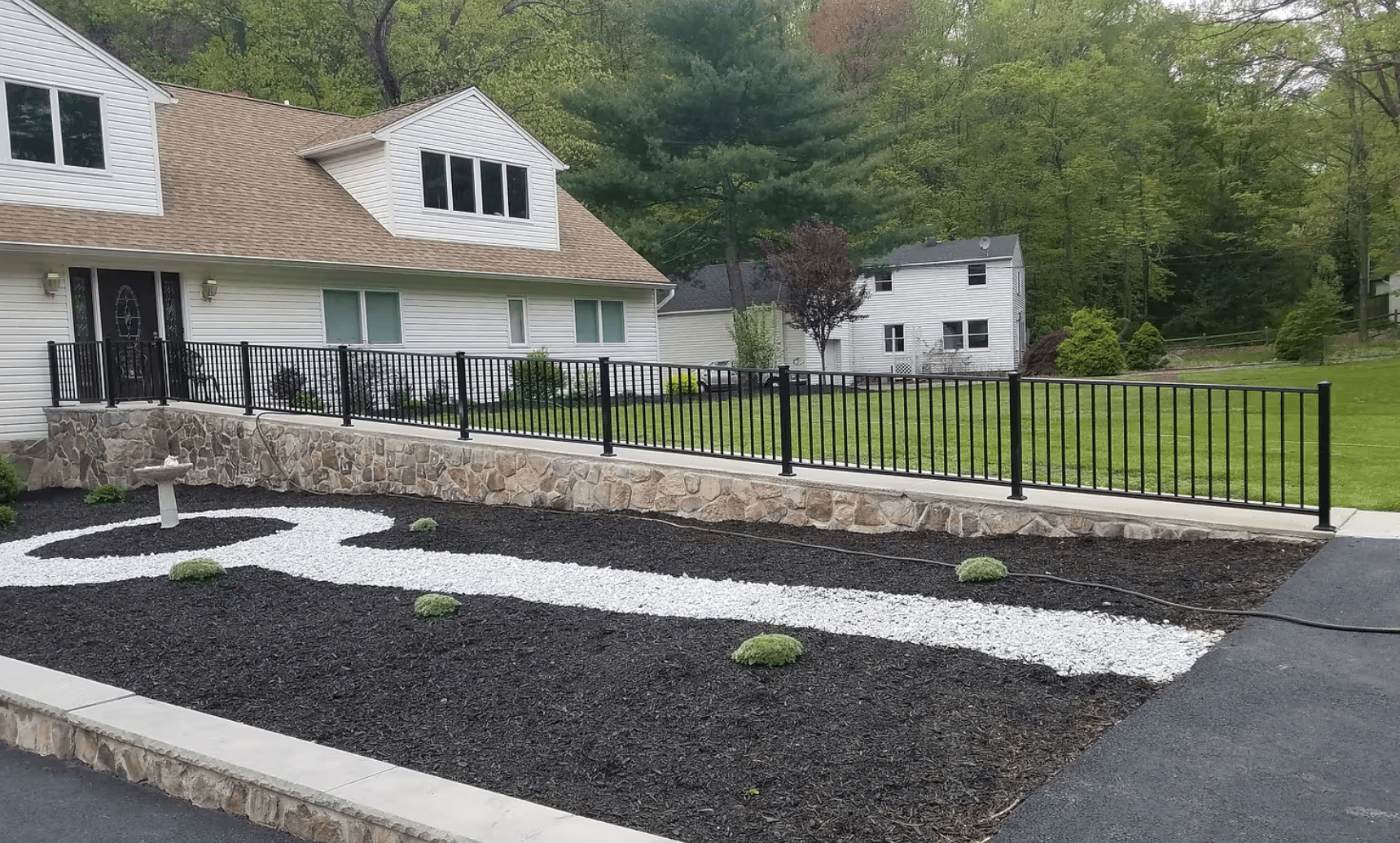 Black Aluminum Fence Mounted on Stone Wall in Rochelle Park NJ image